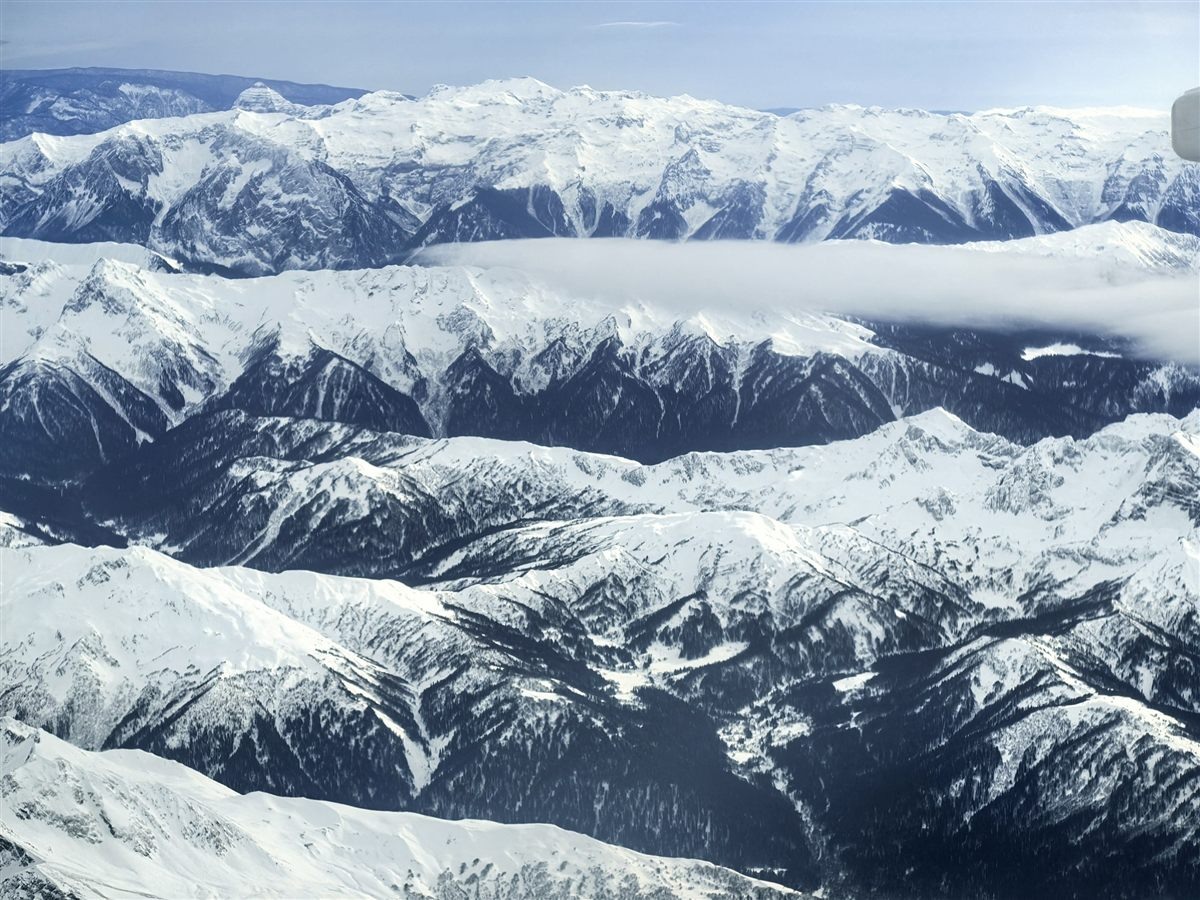 Blue and white mountains seen from high above