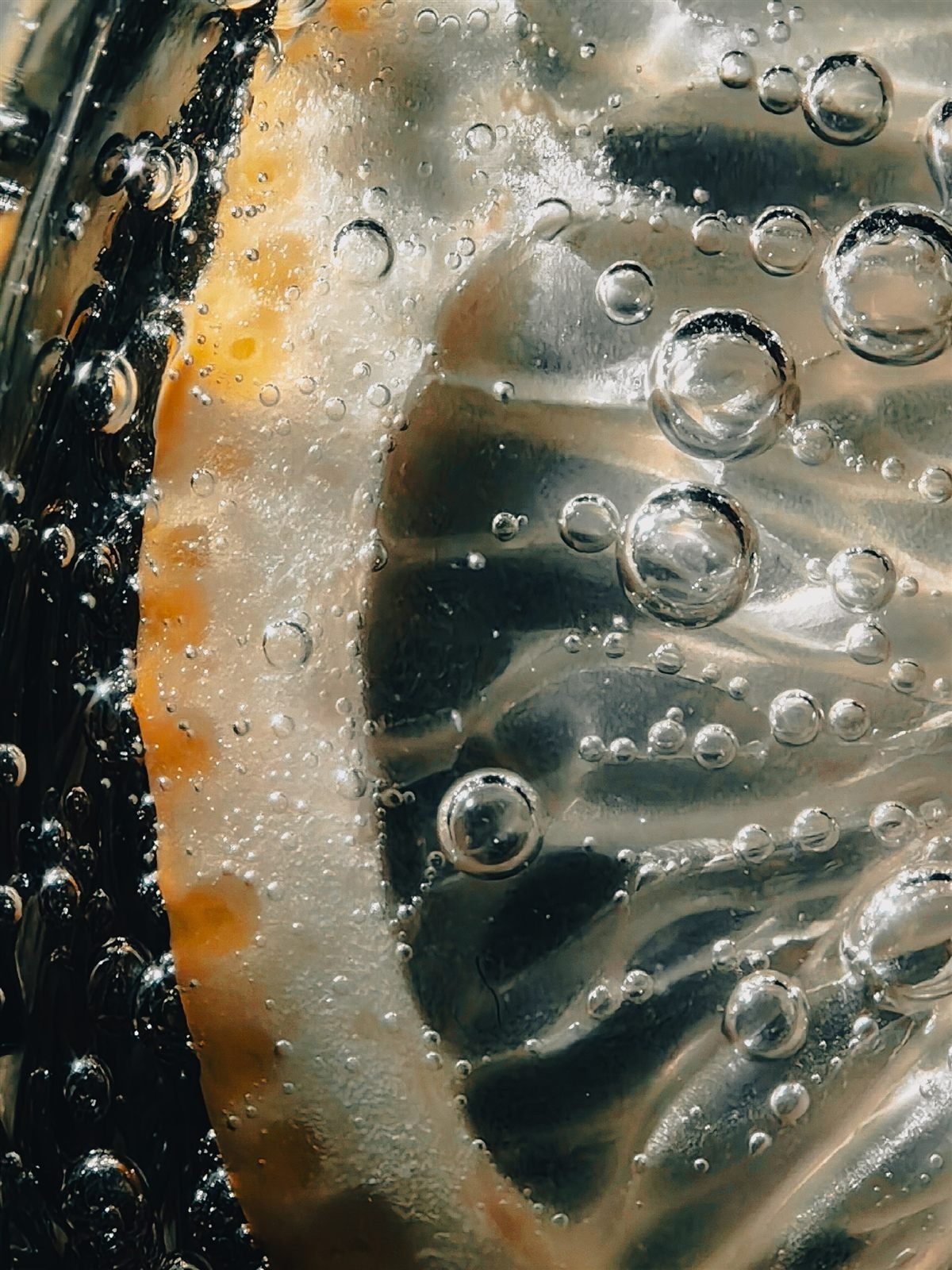 Cinematic macro of a lemon with bubbles