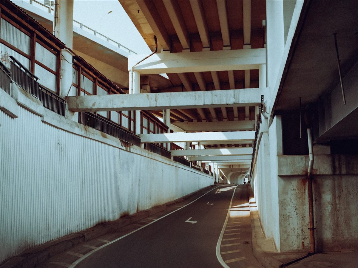 Empty road under an overpass, film look